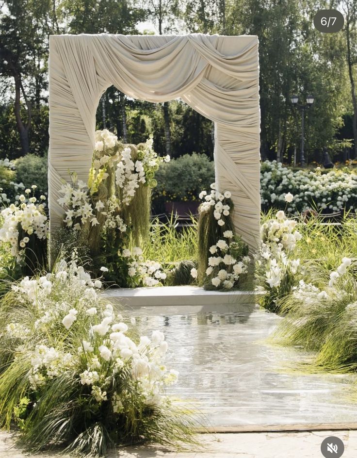 Grand Ivory Draped Ceremony Arch