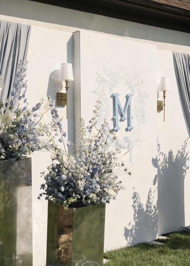 Custom Monogram Backdrop Wall with Brass Sconces