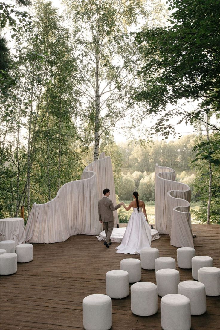 White Cylinder Ottomans at Outdoor Ceremony